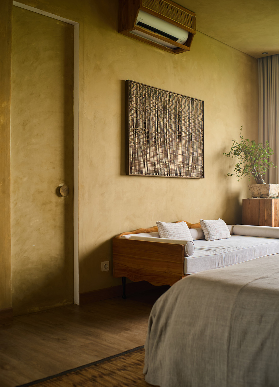 Warm beige lime plaster wall finish in Bali