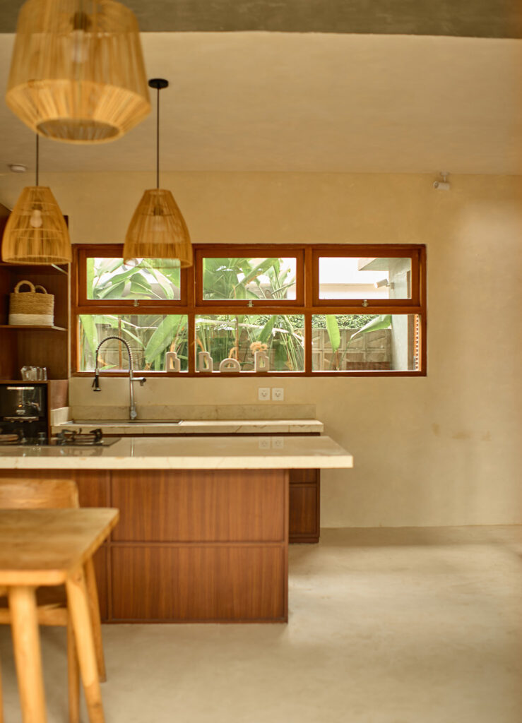 Neutral lime plaster feature wall in Bali interior