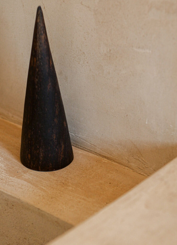 Hand-troweled lime plaster with soft shadow texture